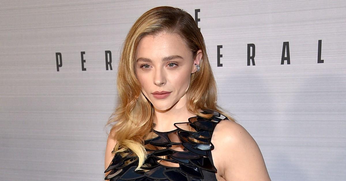 Chloë Grace Moretz posing for a press photo