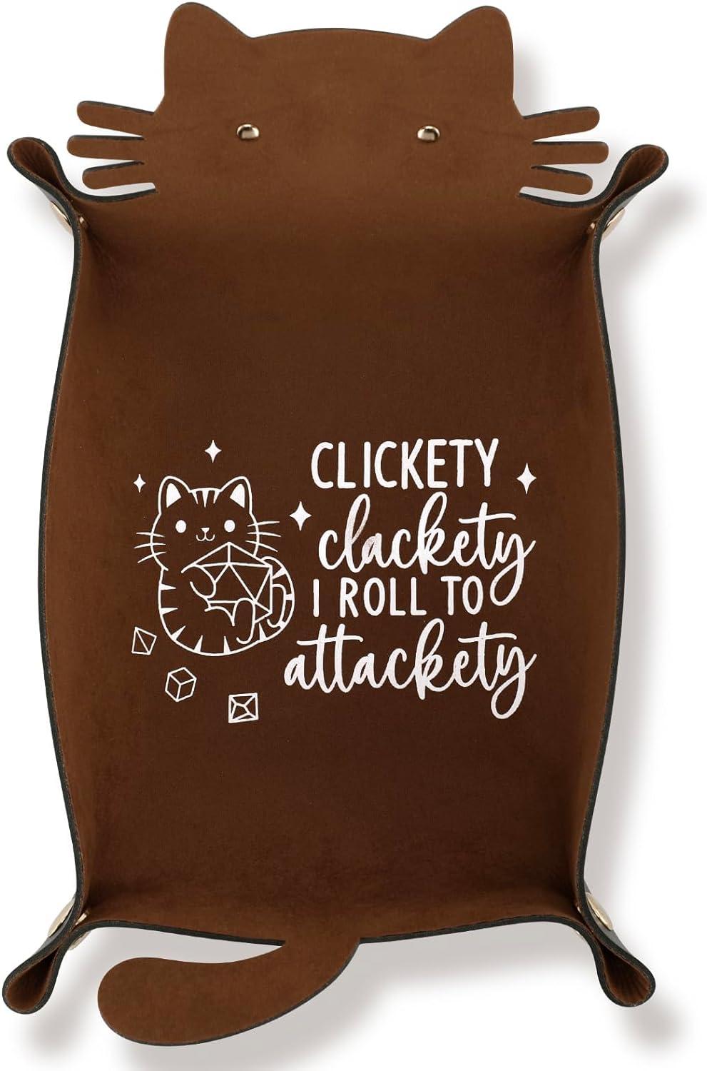 A dice tray shaped like a cat that says "Clickity clackity roll for attackity"