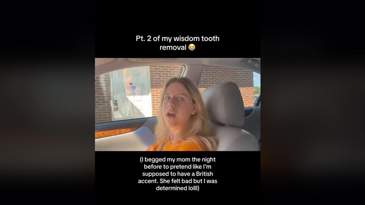 A woman in a car with her mom after getting her wisdom teeth removed