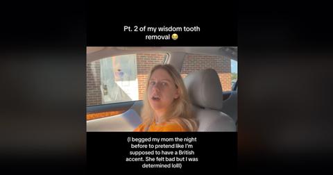A woman in a car with her mom after having her wisdom teeth removed