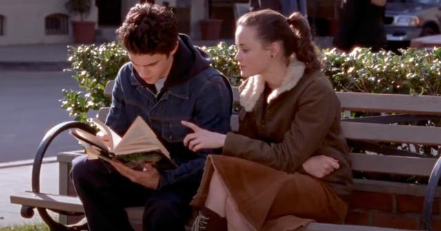 Jess and Rory reading a book