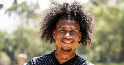 Marco Angulo standing on the soccer field.