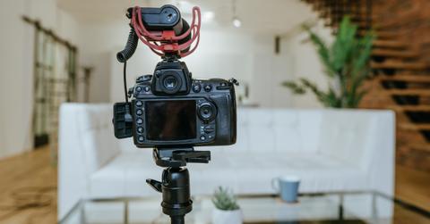 A camera on a tripod in a home