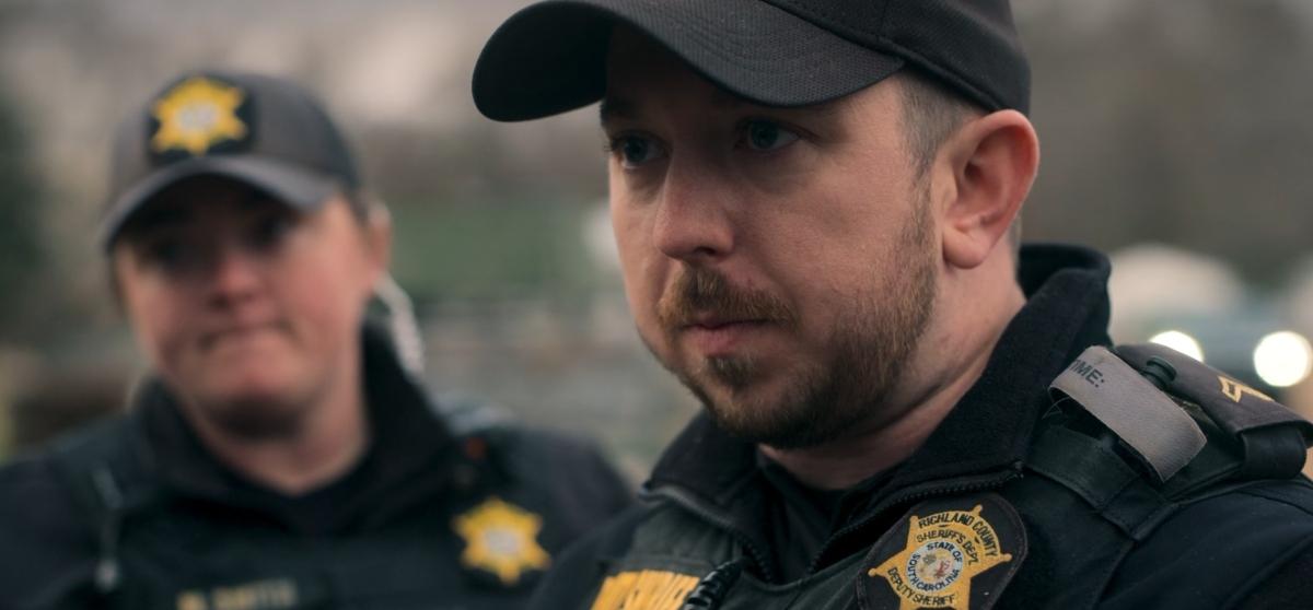 One of the officers on the scene in Missing: Dead or Alive? on Netflix.