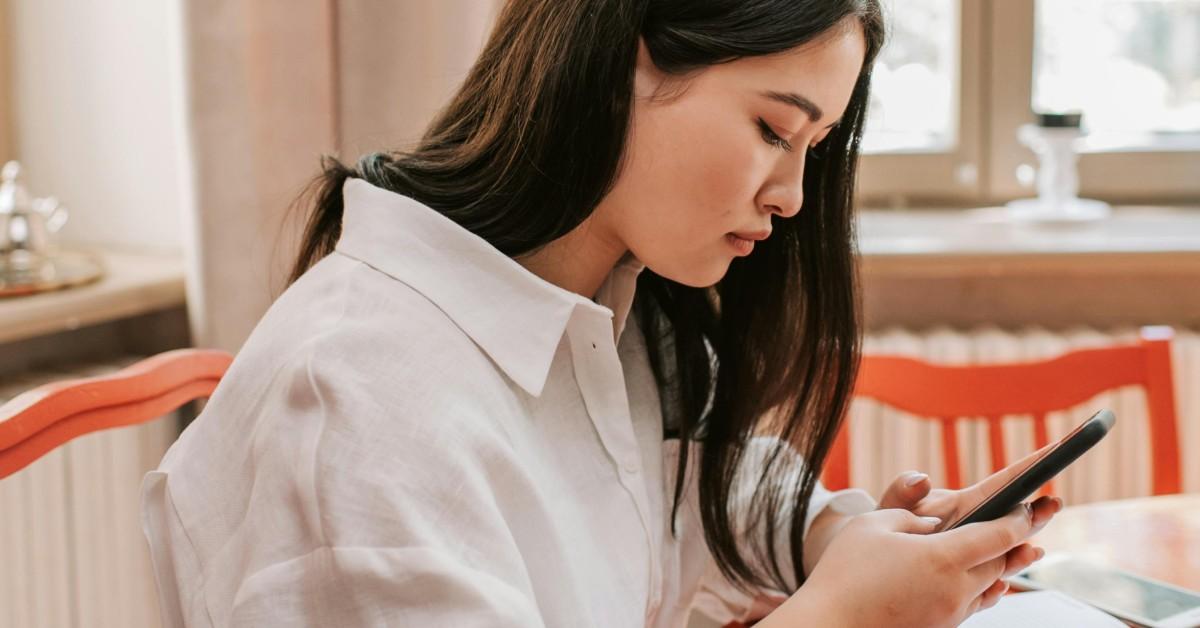 A woman using her phone