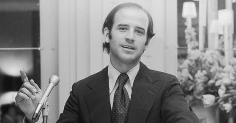 A young Joe Biden in front of a mic.