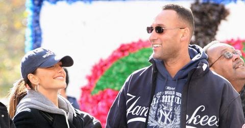 Derek Jeter celebrates with Minka Kelly during the 2009 New York Yankees World Series Victory Parade on Nov. 6, 2009, in New York City.
