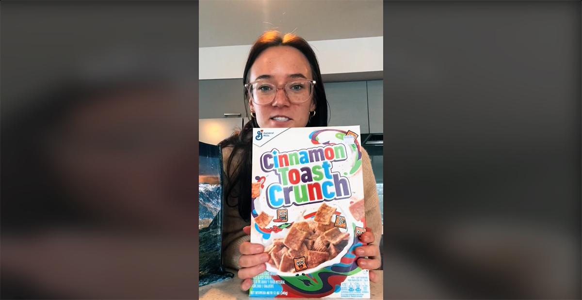 The OP holding a box of Cinnamon Toast Crunch