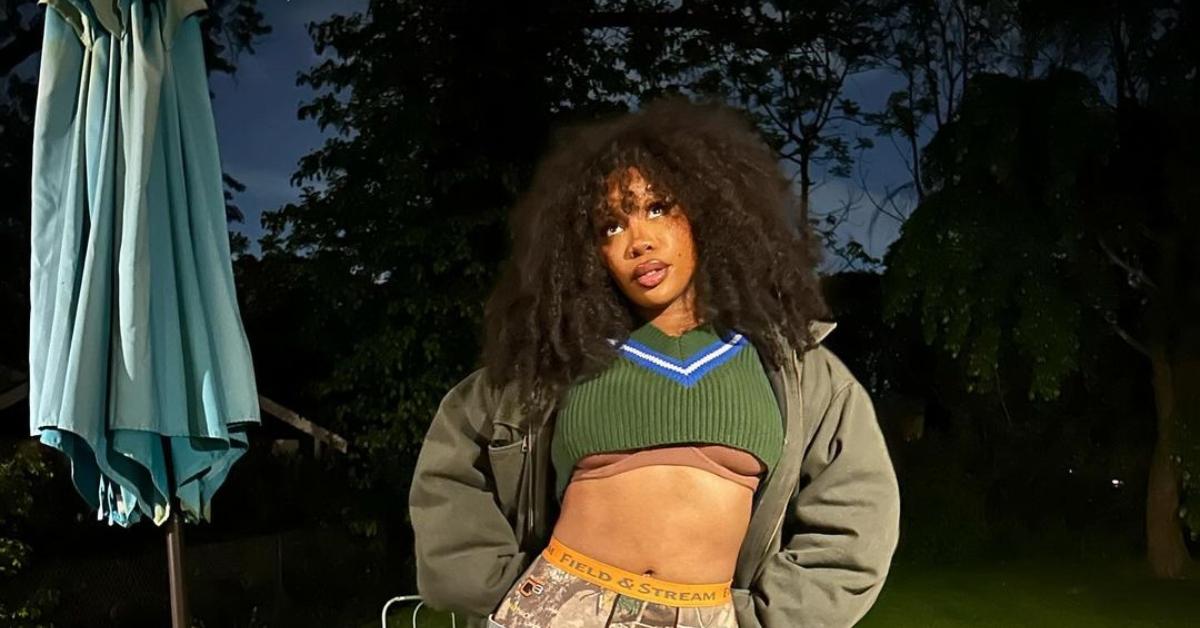 SZA posing outside