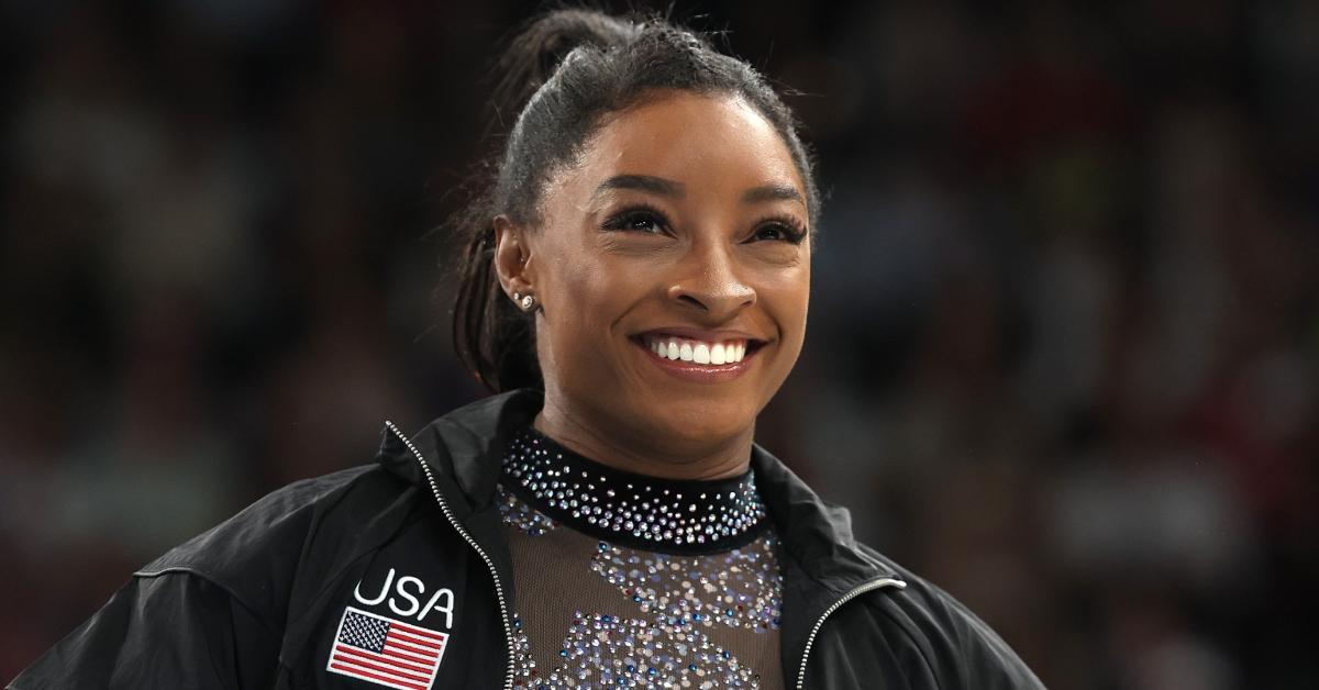 Simone Biles looks on as she arrives for the Artistic Gymnastics Women's Qualification.