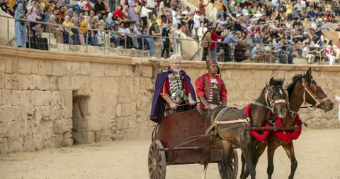 People wearing clothing from Roman Empire period perform within the "Rome Days" Festival at the Amphitheater of El Djem in Mahdia Governorate south of Tunis, Tunisia