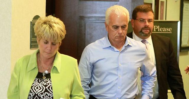 Cindy and George Anthony leaving a courtroom following Casey's acquittal.