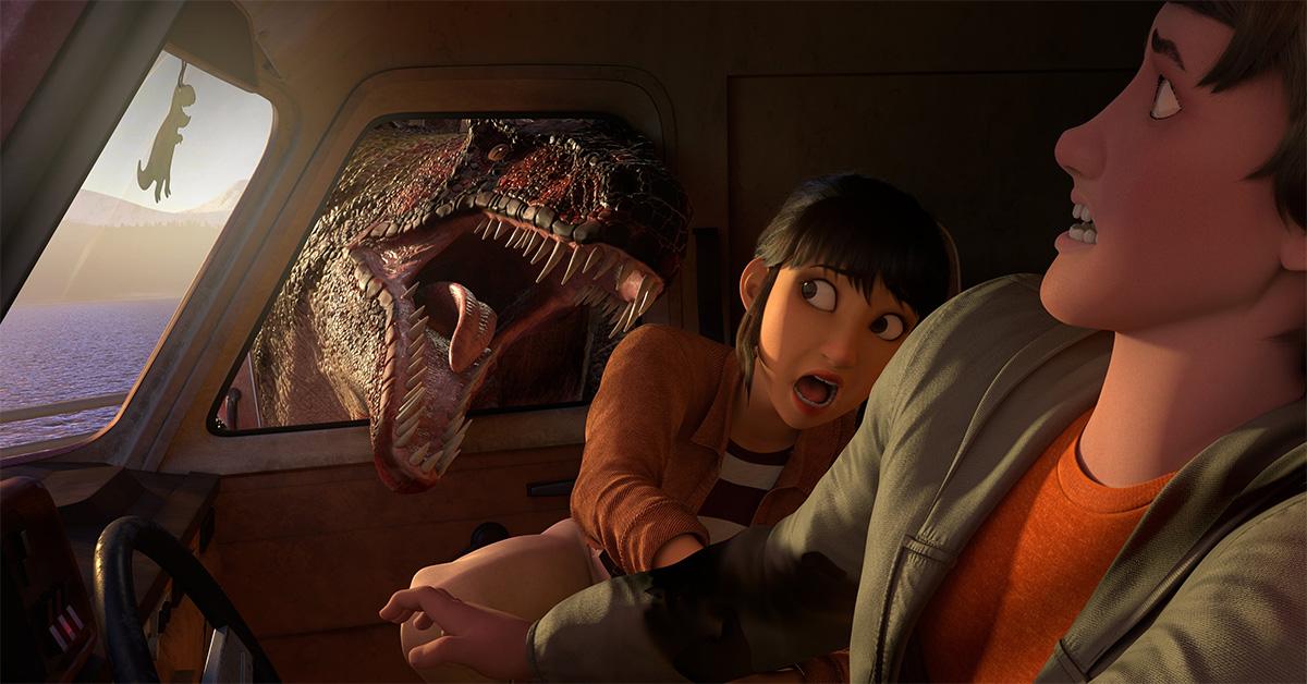 Two people cower from a dinosaur in 'Jurassic World: Chaos Theory.' 