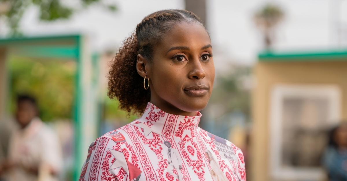 Issa Rae as Issa wearing a red and black printed top on 'Insecure'. 