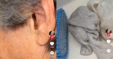 A spider crawling out of a woman's ear