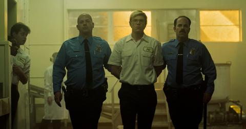 (L to R) Mark Weiler as Officer, Evan Peters as Jeffrey Dahmer