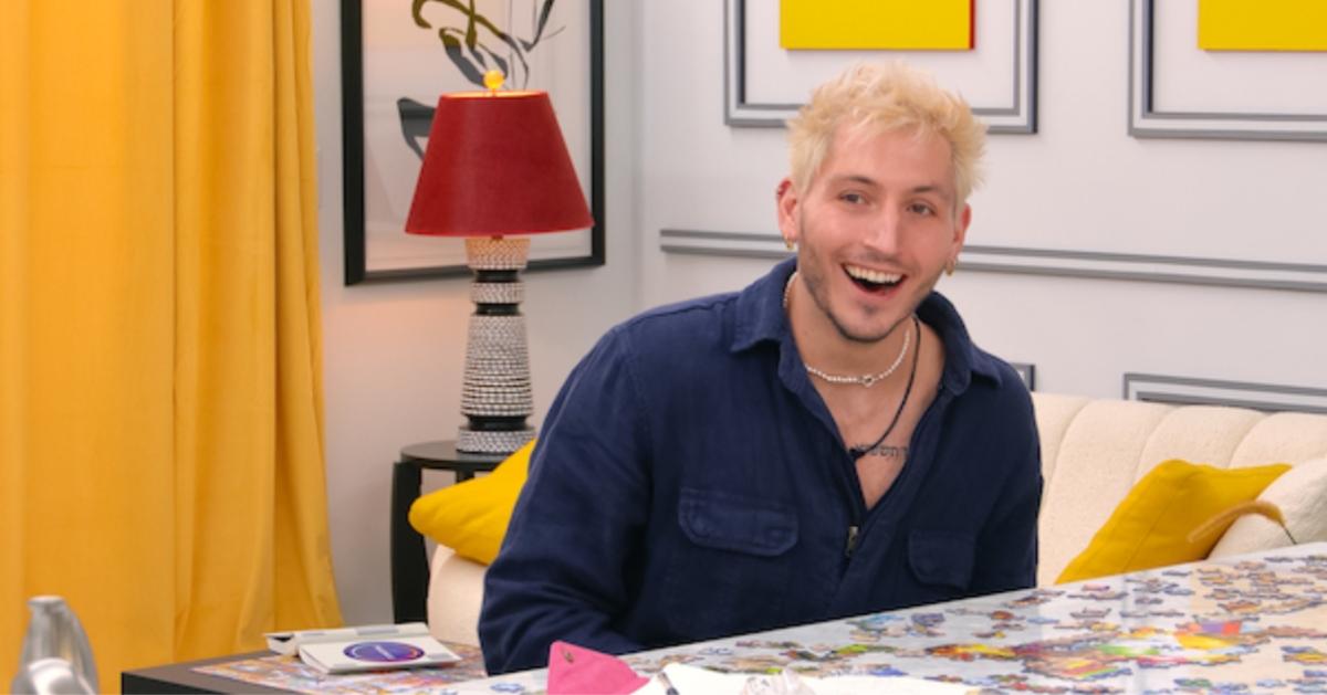 Myles from The Circle sits at his kitchen counter