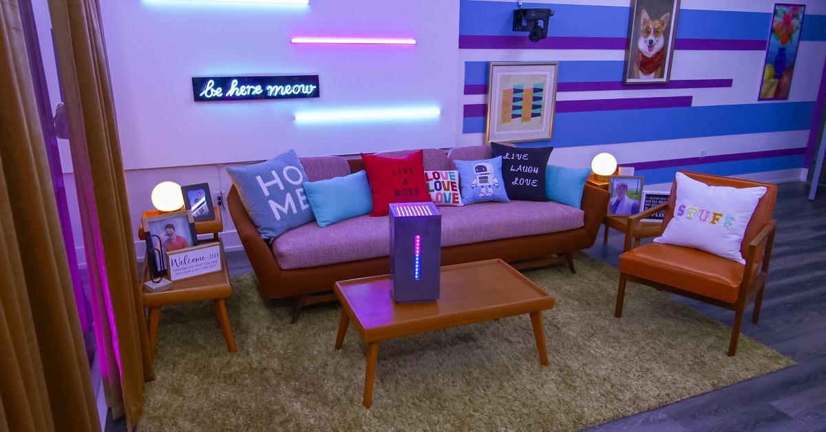 Max the AI in a living room apartment on The Circle