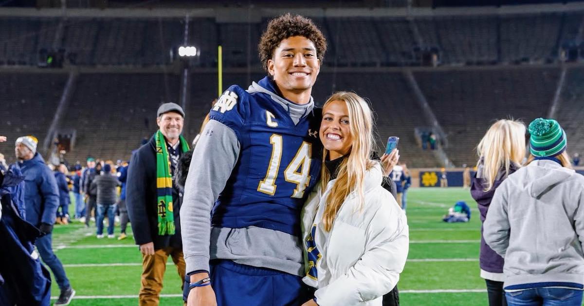 Notre Dame safety Kyle Hamilton holds a jersey after being chosen