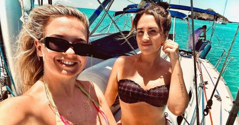 Daisy Kelliher and her sister Bonnie Kelliher pose for an Instagram photo on a boat