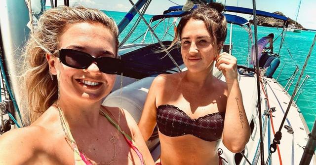 Daisy Kelliher and her sister Bonnie Kelliher pose for an Instagram photo on a boat