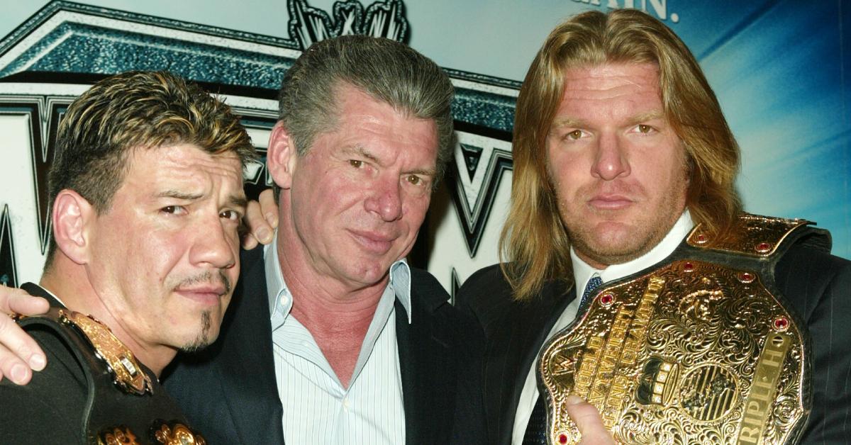 Eddie Guerrero, Vince McMahon, and Triple H in 2004