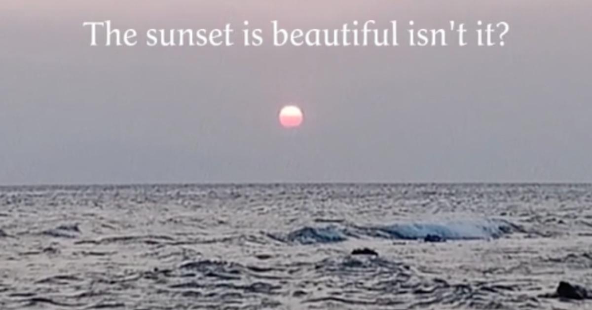 A TikTok video that explains what the meaning of "the sunset is beautiful, isn't it."