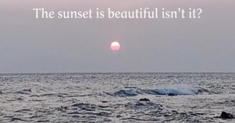 A TikTok video that explains what the meaning of "the sunset is beautiful, isn't it."