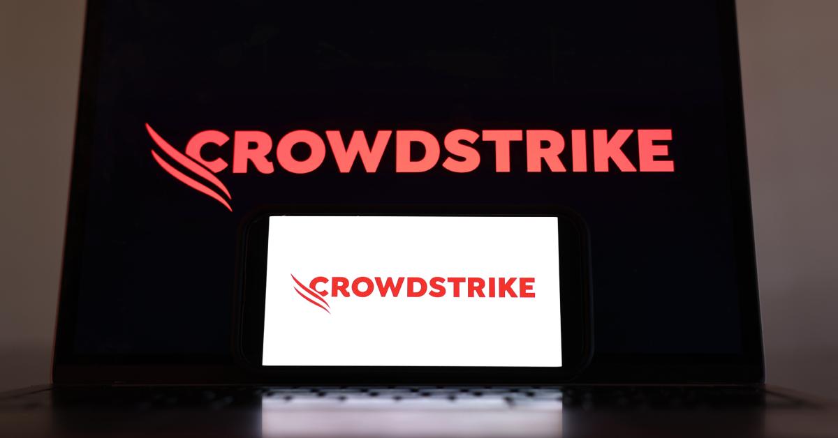 CrowdStrike logo on a smartphone and laptop.