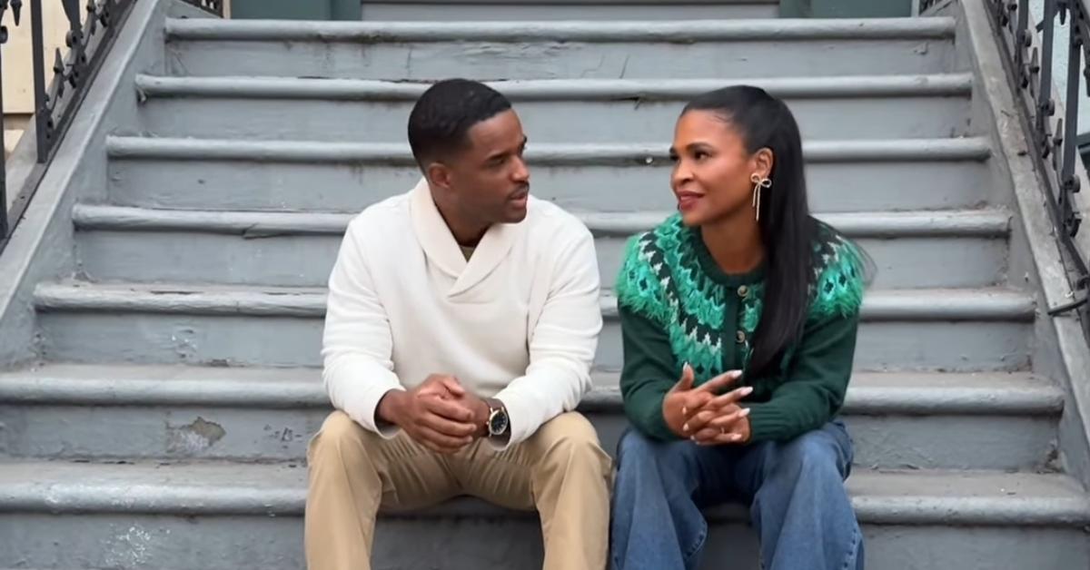 (l-r): Larenz Tate and Nia Long on a stoop while filming Walmart commercial