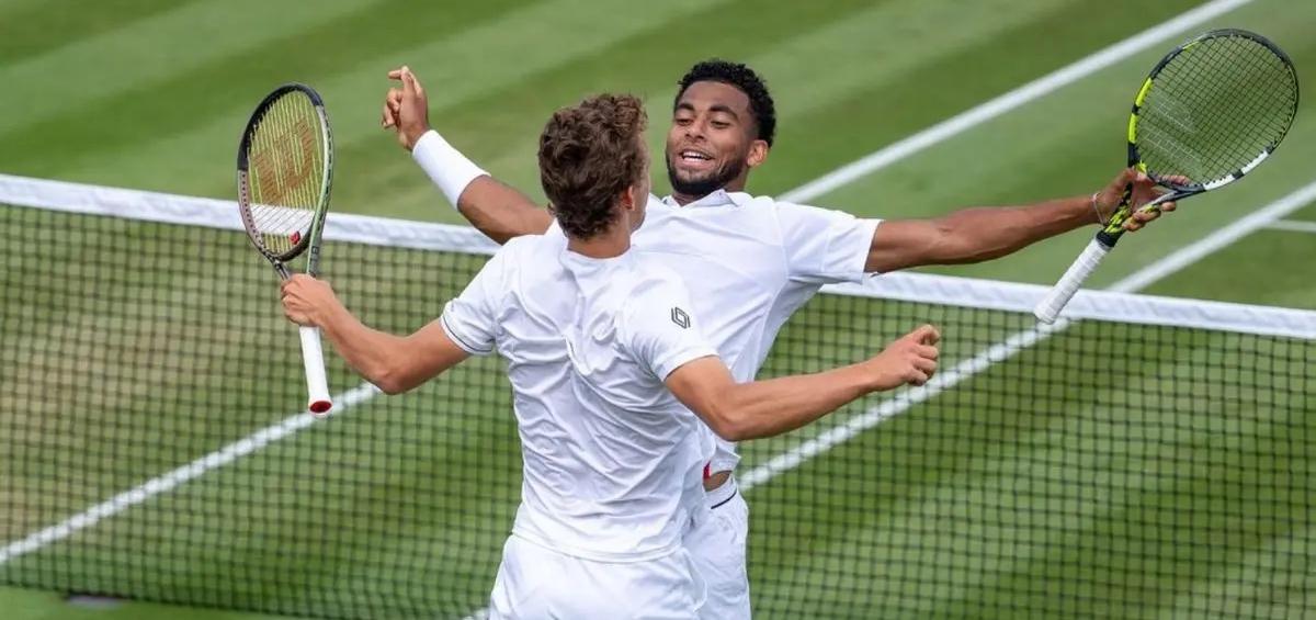 Luca Van Assche and Arthur Fils during a men's doubles match at the 2023 Wimbledon in London