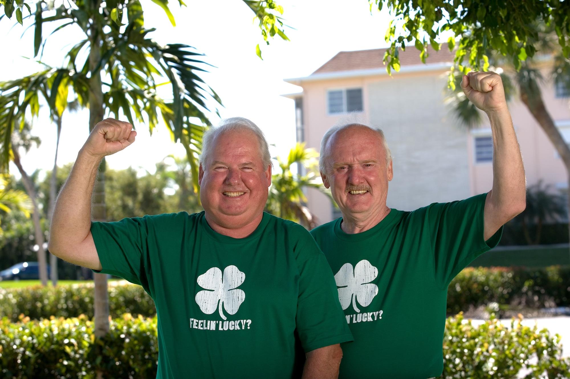 men wearing matching green feeling lucky t-shirts