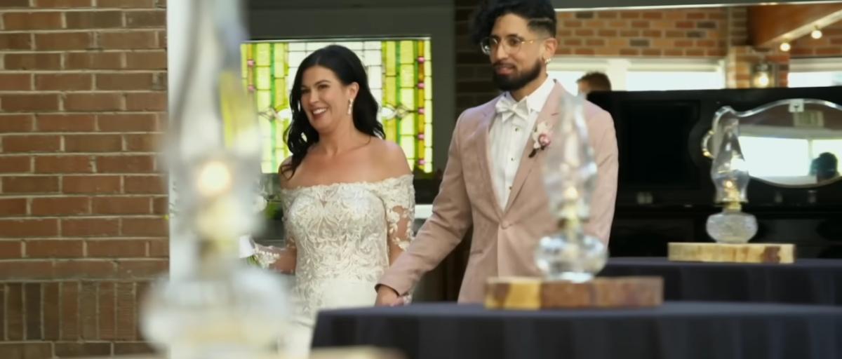 Chloe and Michael walk into their reception on Married at First Sight