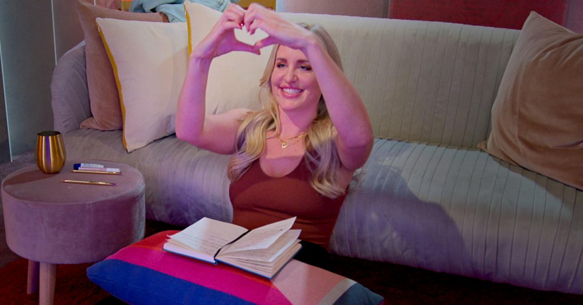 Laura makes a heart with her hands in Season 6 of 'Love Is Blind.'