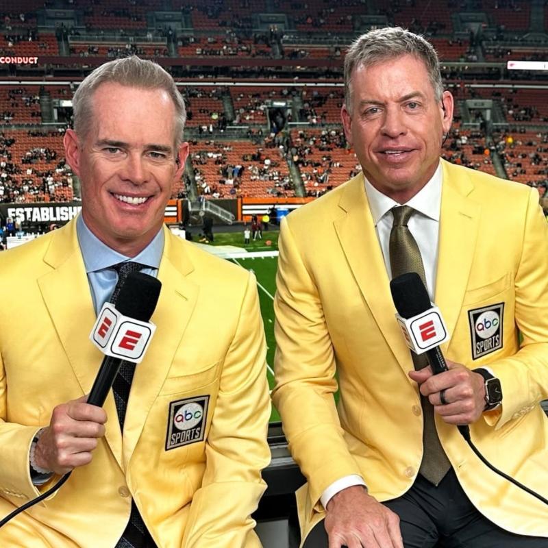 Troy Aikman with Joe Buck at the Cleveland Stadium.