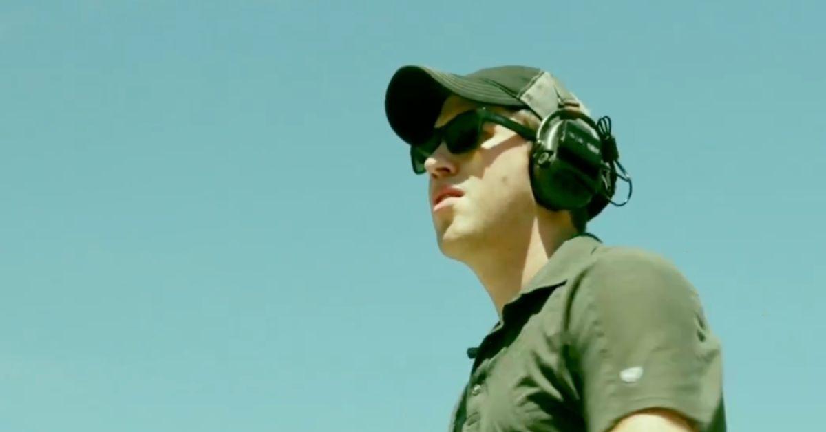 Lucas Botkin in a hat and ear protectors. 