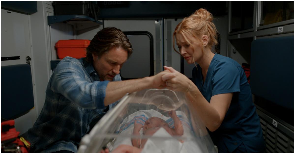Jack and Mel in the ambulance with their baby