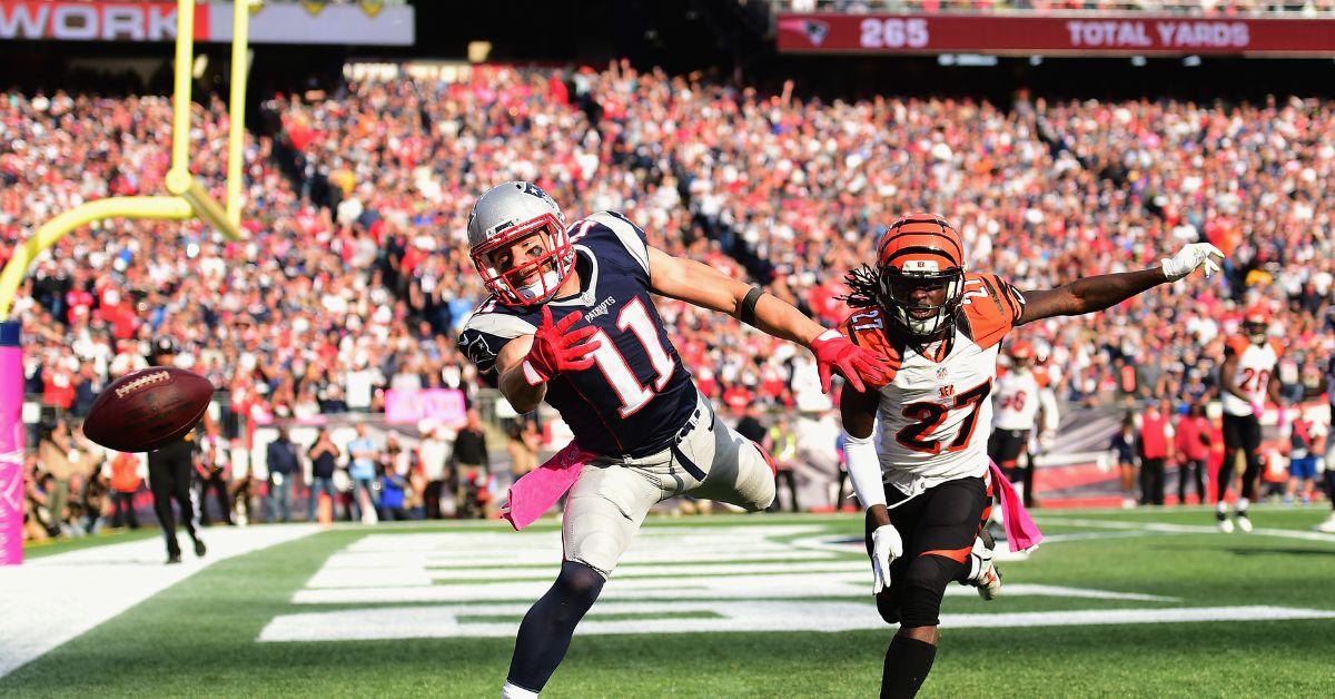 Julian Edelman #11 of the New Engalnd Patriots attempts a catch against Dre Kirkpatrick #27 of the Cincinnati Bengals 