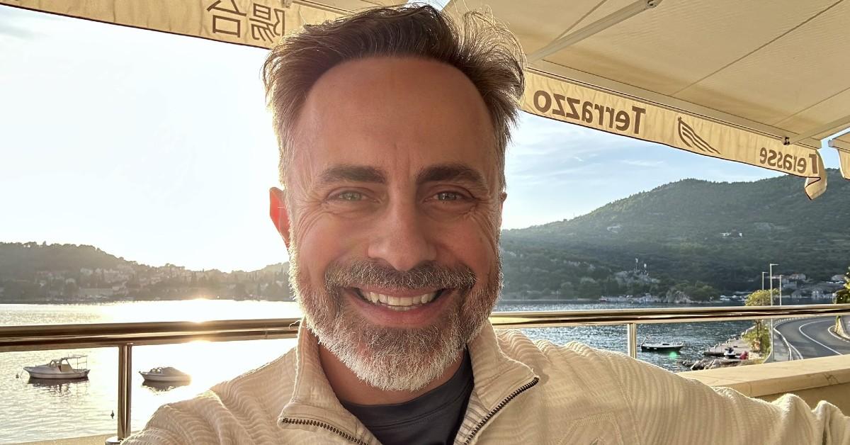 Jeremy Boreing taking a selfie on a boat