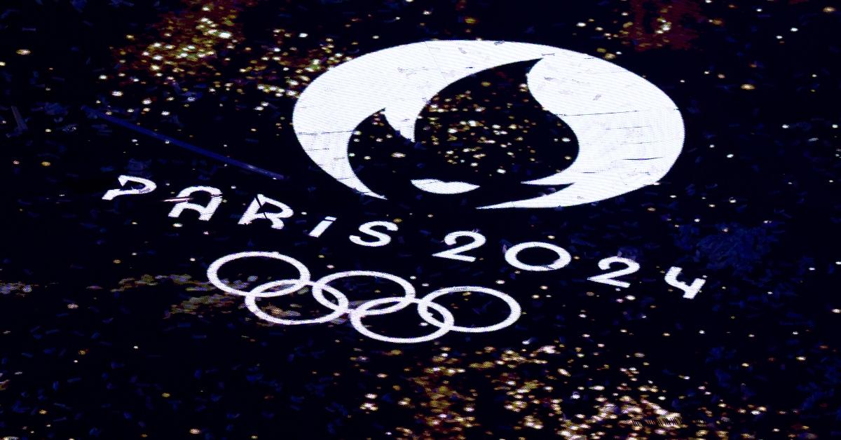 The PARIS 2024 sign and Olympic Rings logo