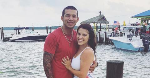 Javi and Lauren on a lake.