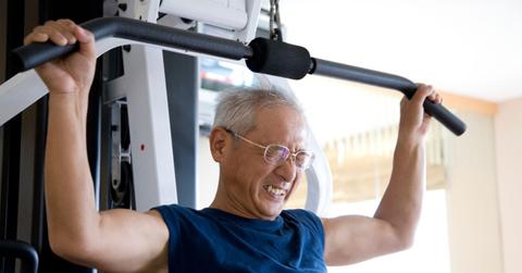 Man pulling a weight at the gym.