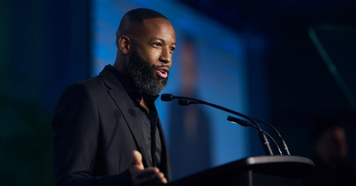 Carlos King speaking at an event