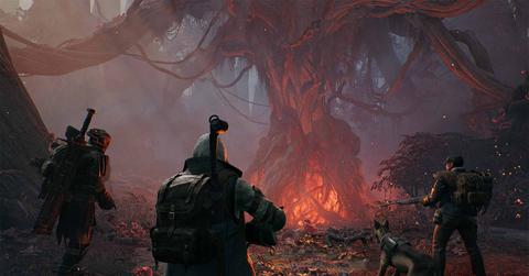 'Remnant II' Group of players heading toward a Rot Root.