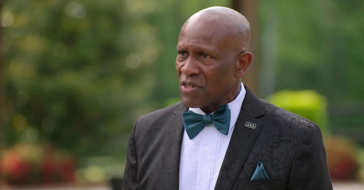 On his son's wedding day in the Season 6 finale of 'Love Is Blind,' Clay Gravesande's dad, Trevor, dons a tuxedo accessorized with a teal pocket square and bow tie.