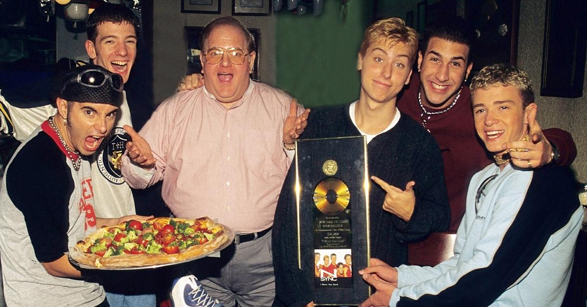 Lou Pearlman with NSYNC members at N.Y.P.D. pizza in Miami.