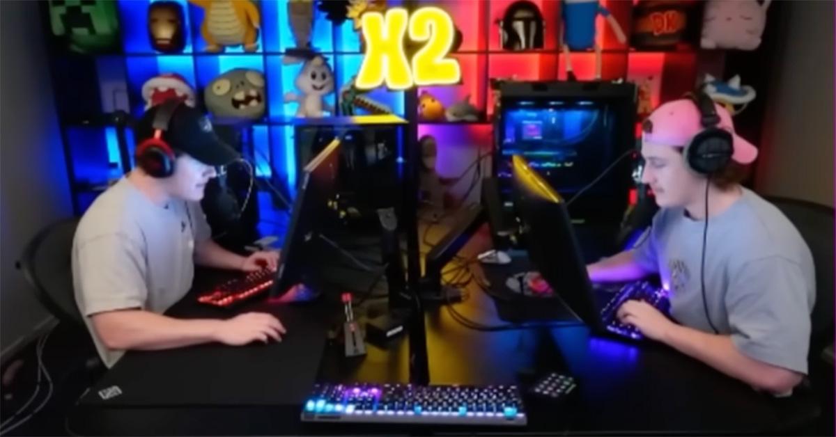 The X2 Twins streaming with their PCs facing one another. 