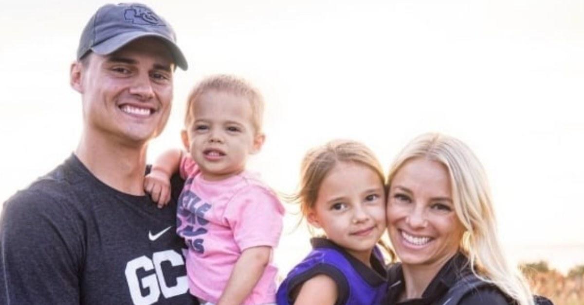 Coach Molly Miller with her husband and two young kids.