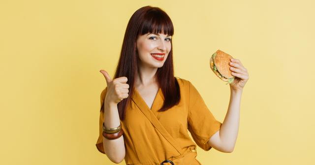 Woman eating a burger