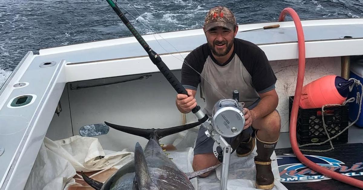 Tyler Macallister on his boat